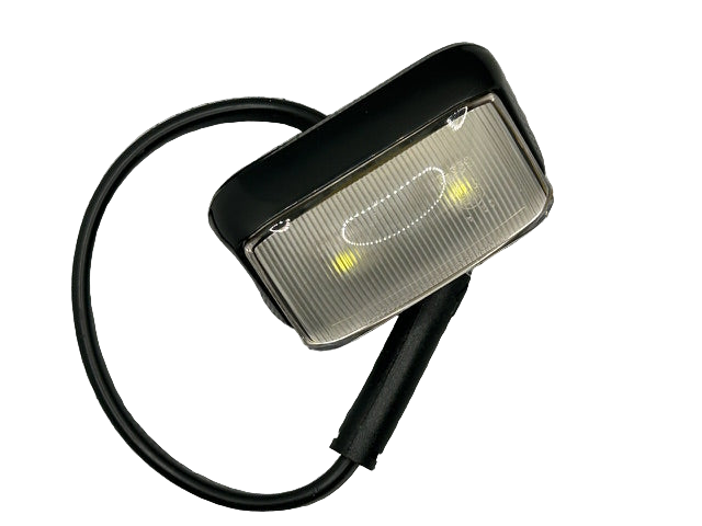 Small rectangular light with black cable on a white background