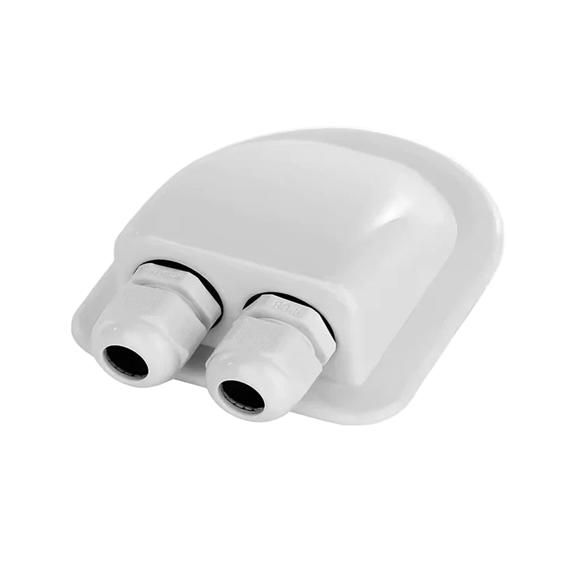 White plastic fitting with two cylindrical holes on a white background