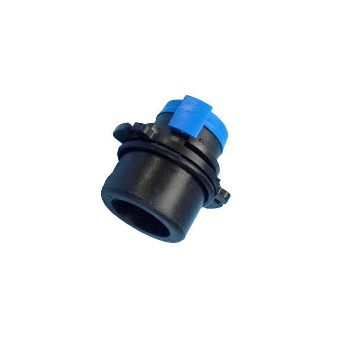 Black mechanical component with blue cap on a light blue background